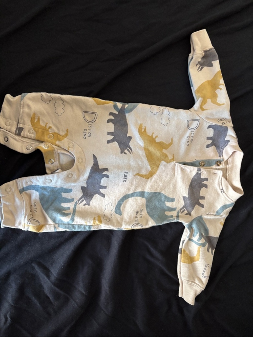 Carter's Cream One-Piece Dino Print Pajamas with Blue and Mustard Dinosaurs